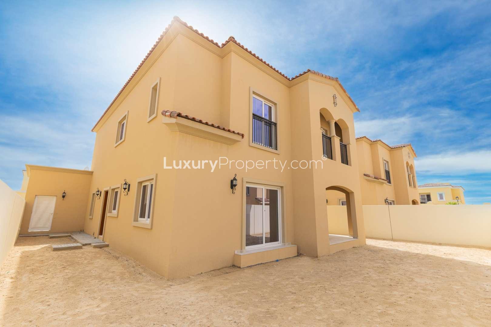 Villa exterior in Villanova, Dubai Land; spacious, modern design near park and pool