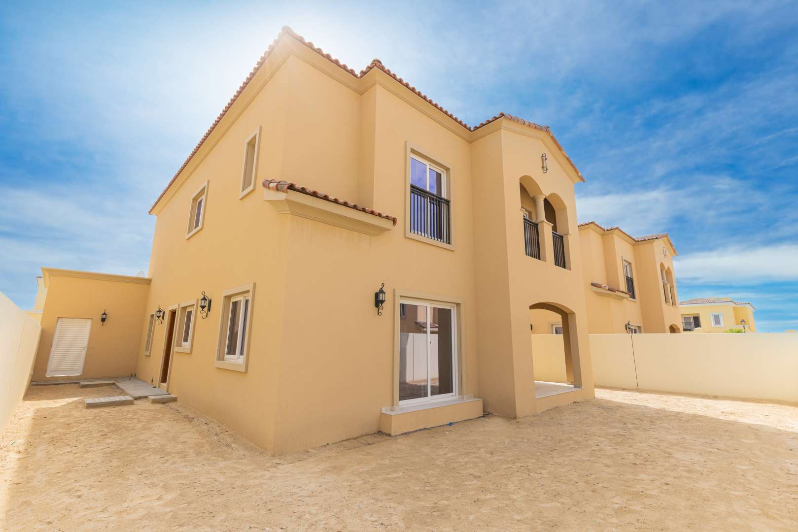 Villa exterior in Villanova, Dubai Land; spacious, modern design near park and pool