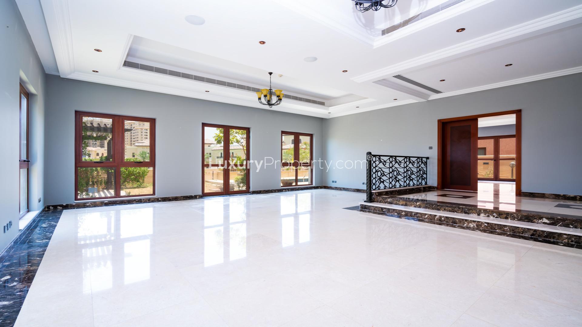 Lake and pool view from villa in Jumeirah Golf Estates, Fire community