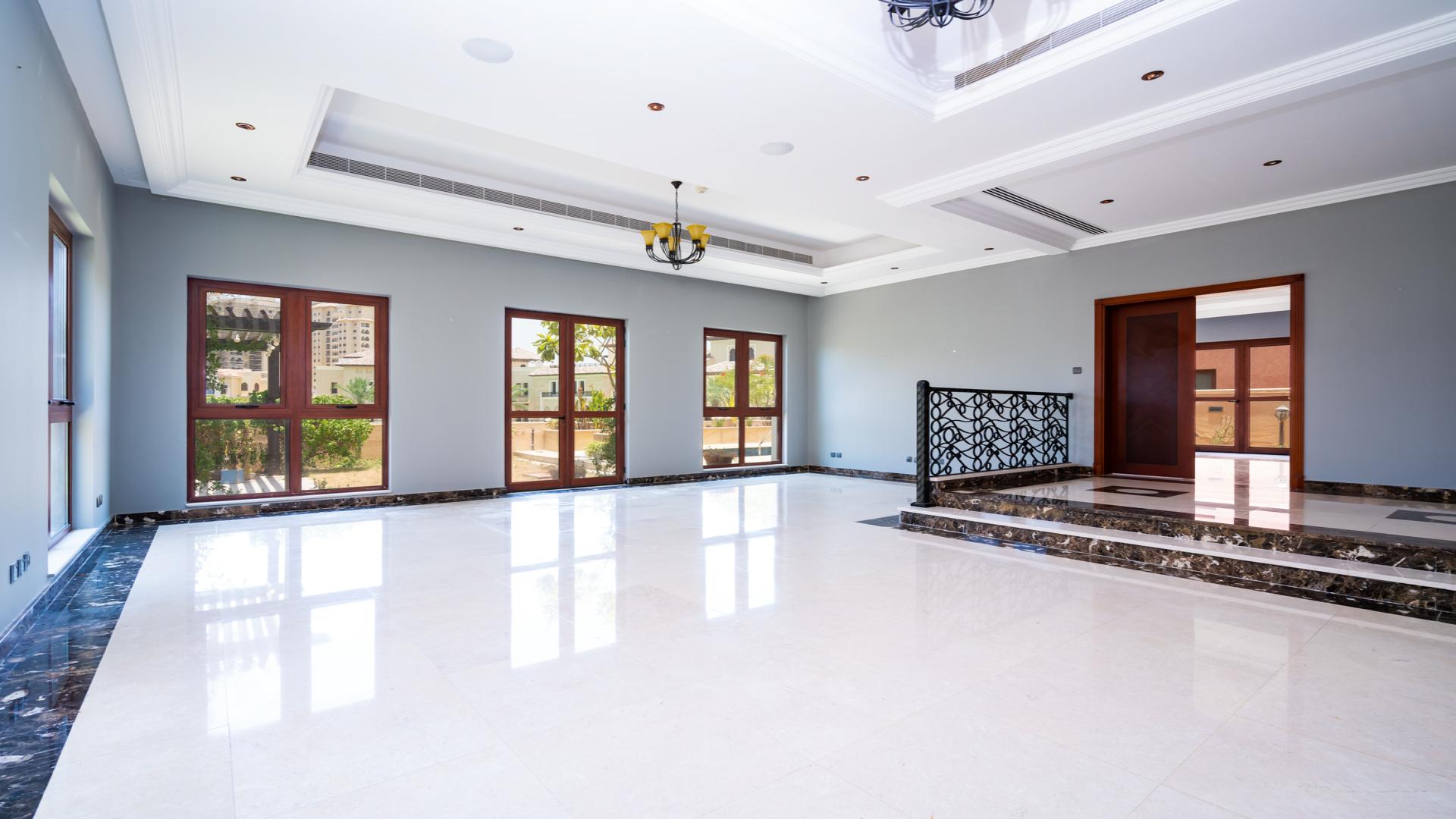 Lake and pool view from villa in Jumeirah Golf Estates, Fire community