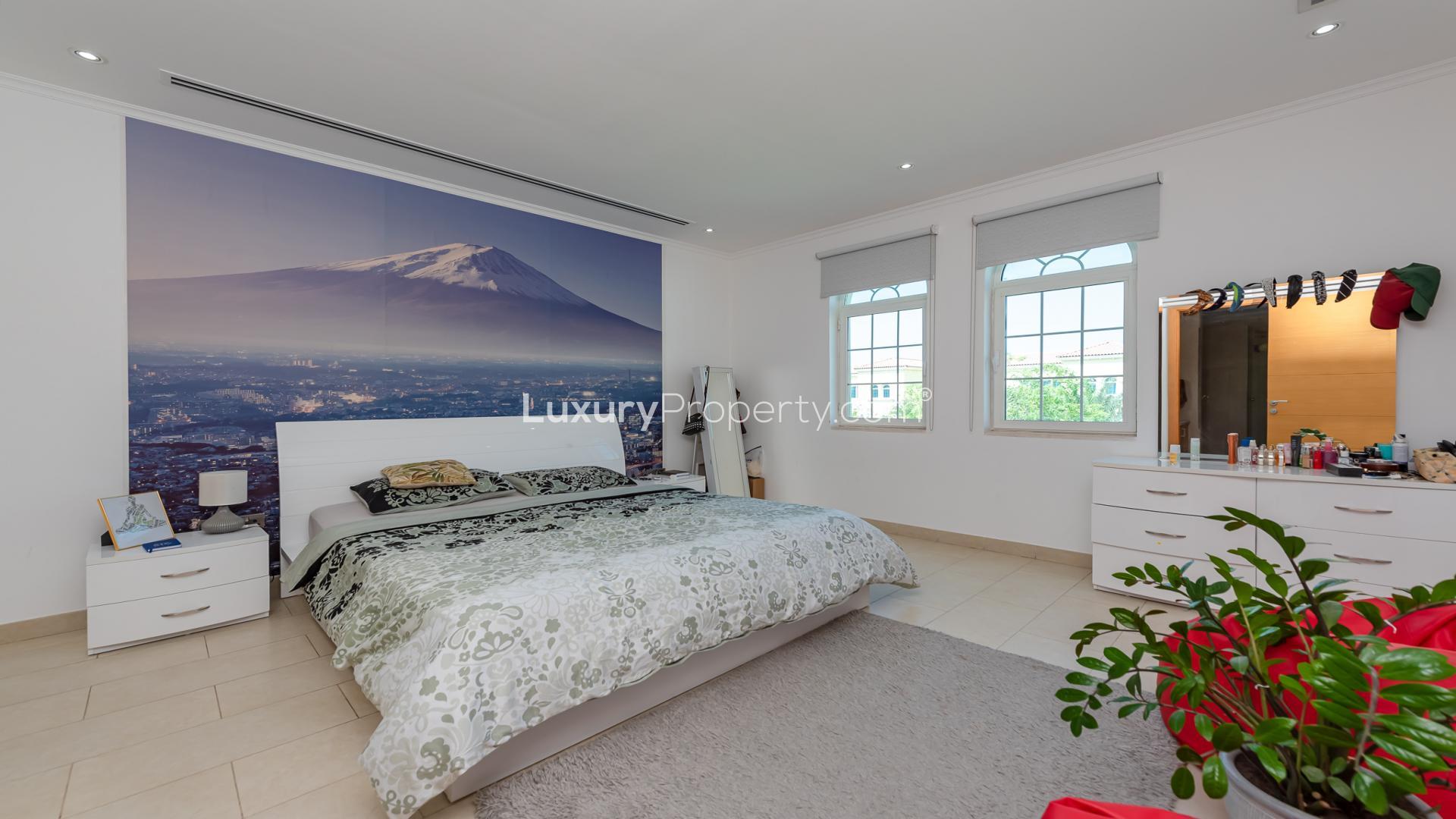 Luxurious bathroom in 4-bedroom Legacy Villa, Jumeirah Park, featuring modern fixtures and mosaic tiles