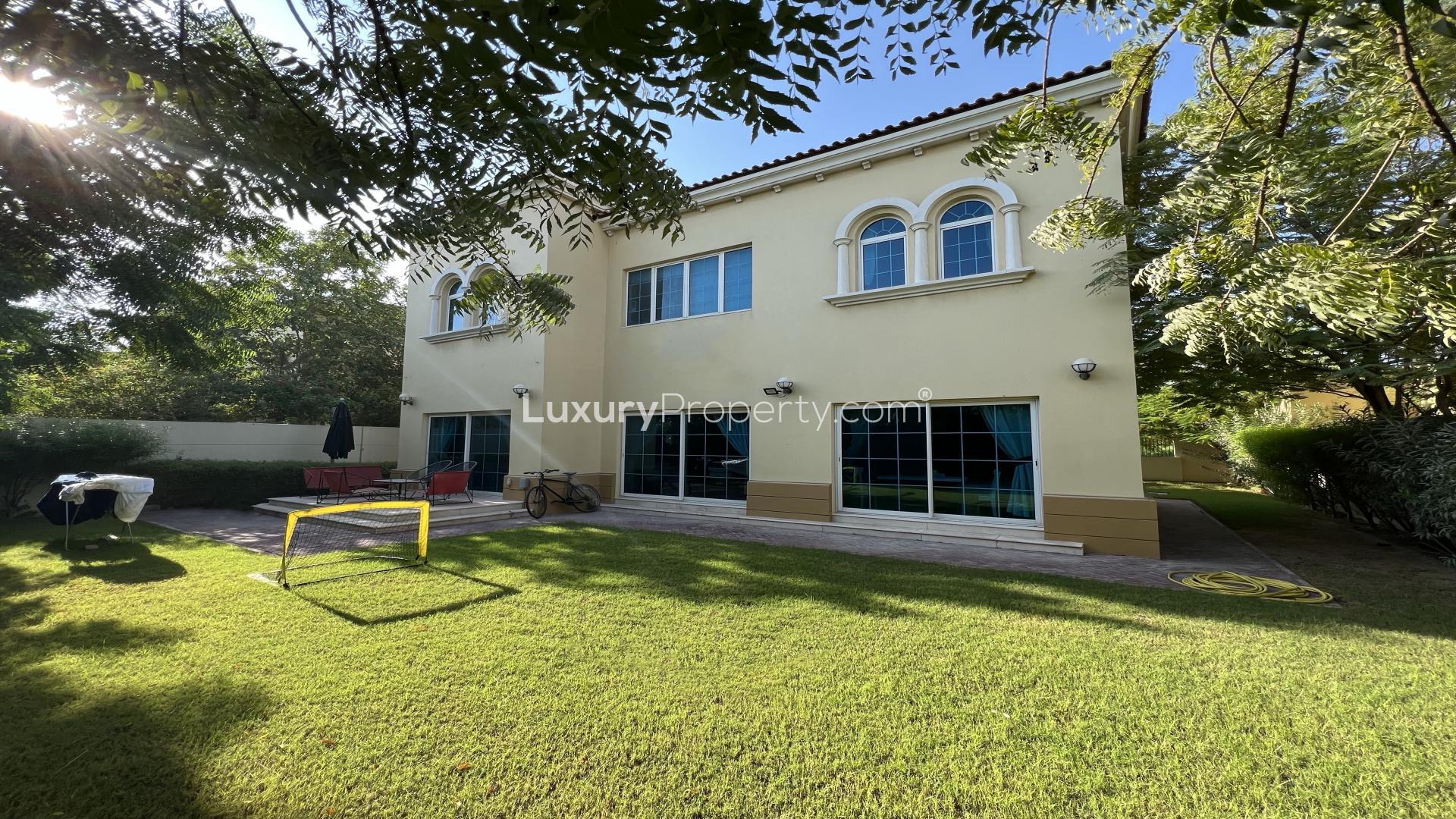 Luxurious living area in Legacy villa, Jumeirah Park with elegant decor and staircase