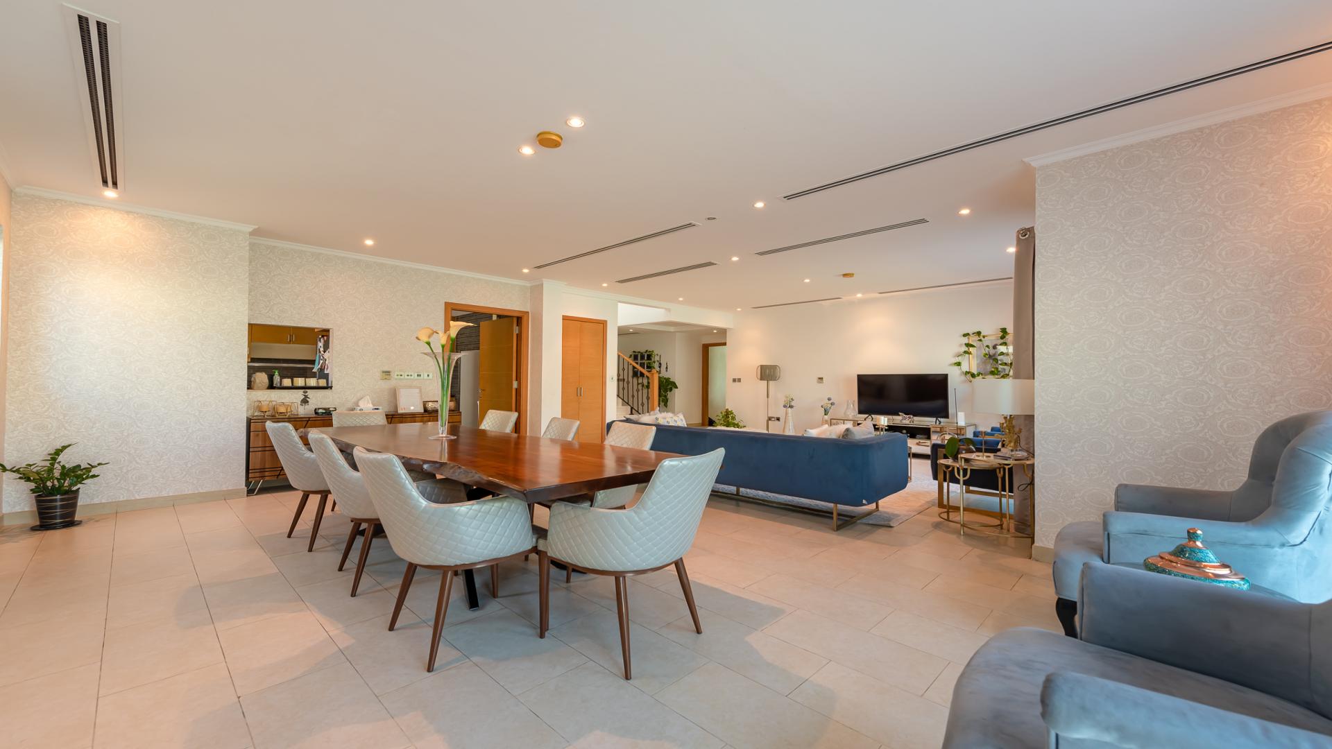 Legacy Style Villa in Jumeirah Park with Spacious Backyard and Patio Furniture,Luxurious living room in Legacy Style villa, Jumeirah Park, featuring elegant dining area