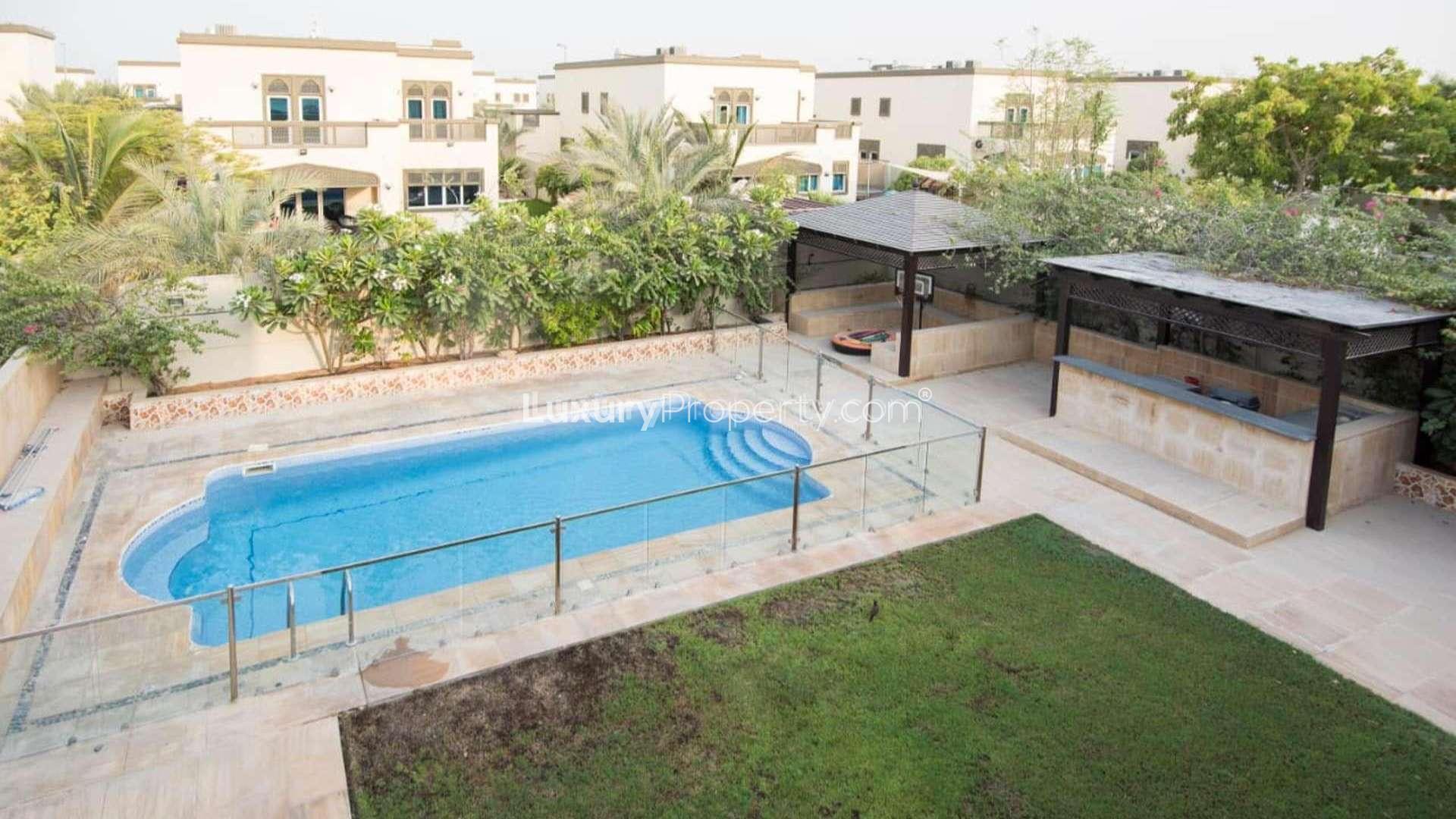 Luxurious living room in Legacy Villa, Jumeirah Park, with elegant furnishings and decor