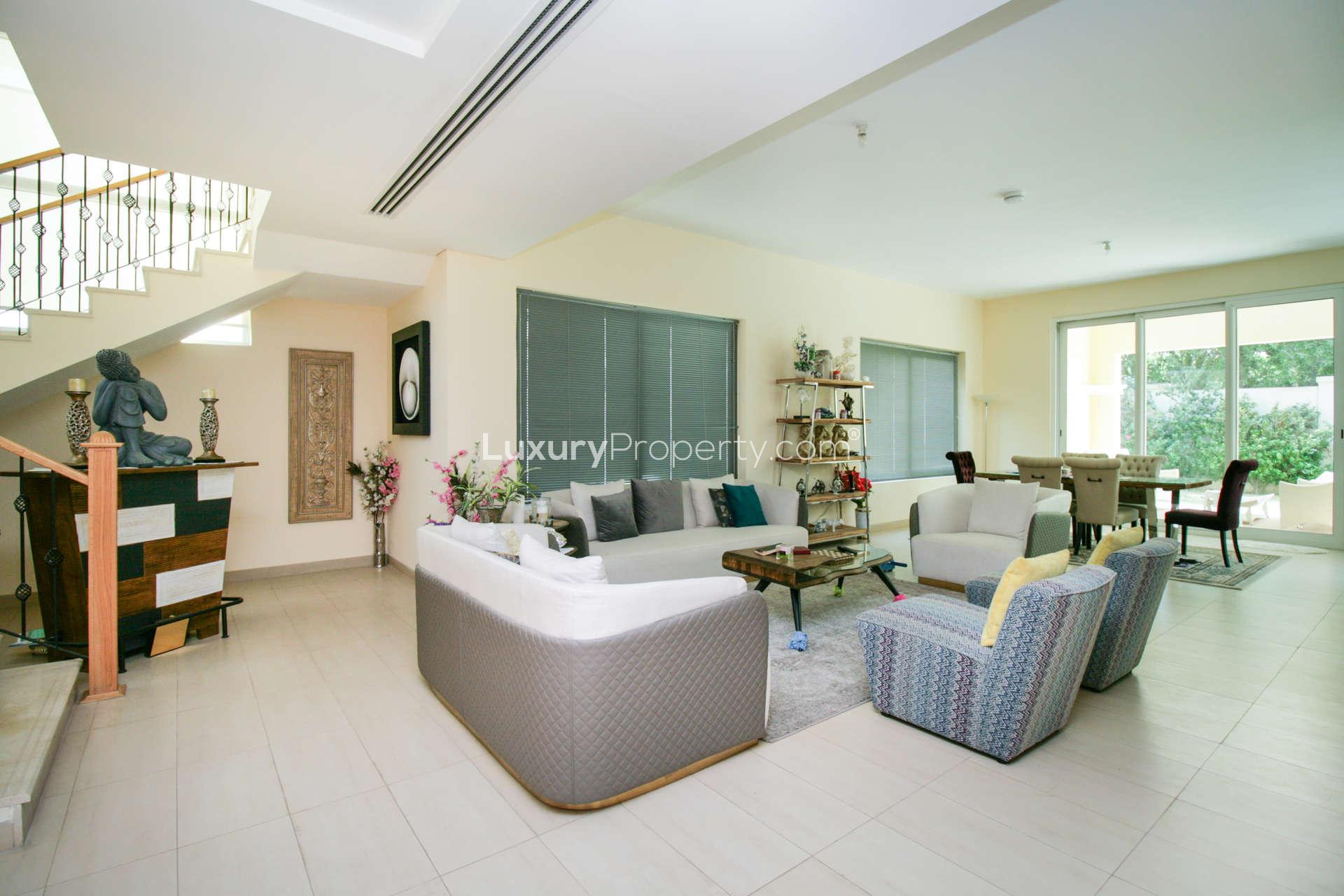 Spacious hallway in 4-bedroom Legacy Nova Villa, Jumeirah Park, with skylight and modern decor