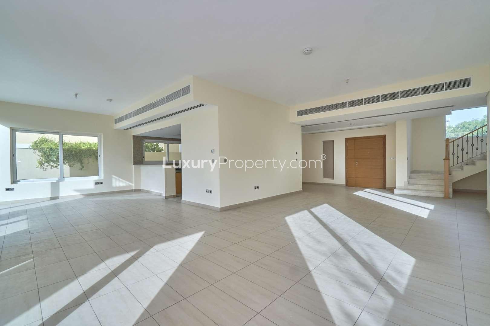 Sunlit living room with large windows in Nova Villa, Legacy Nova, Jumeirah Park