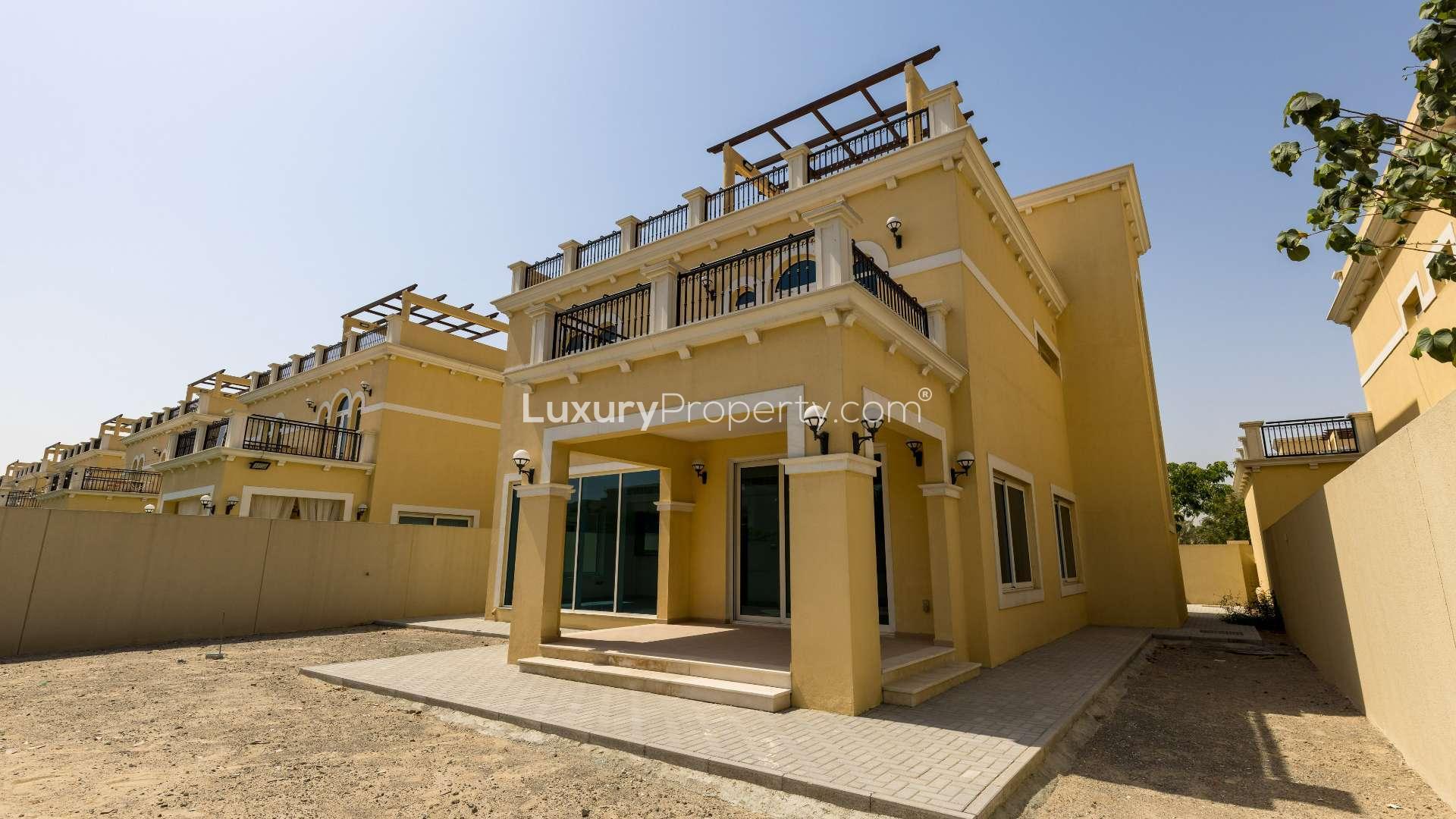 Spacious living area in Jumeirah Park Legacy Nova Villa, featuring modern open-plan design