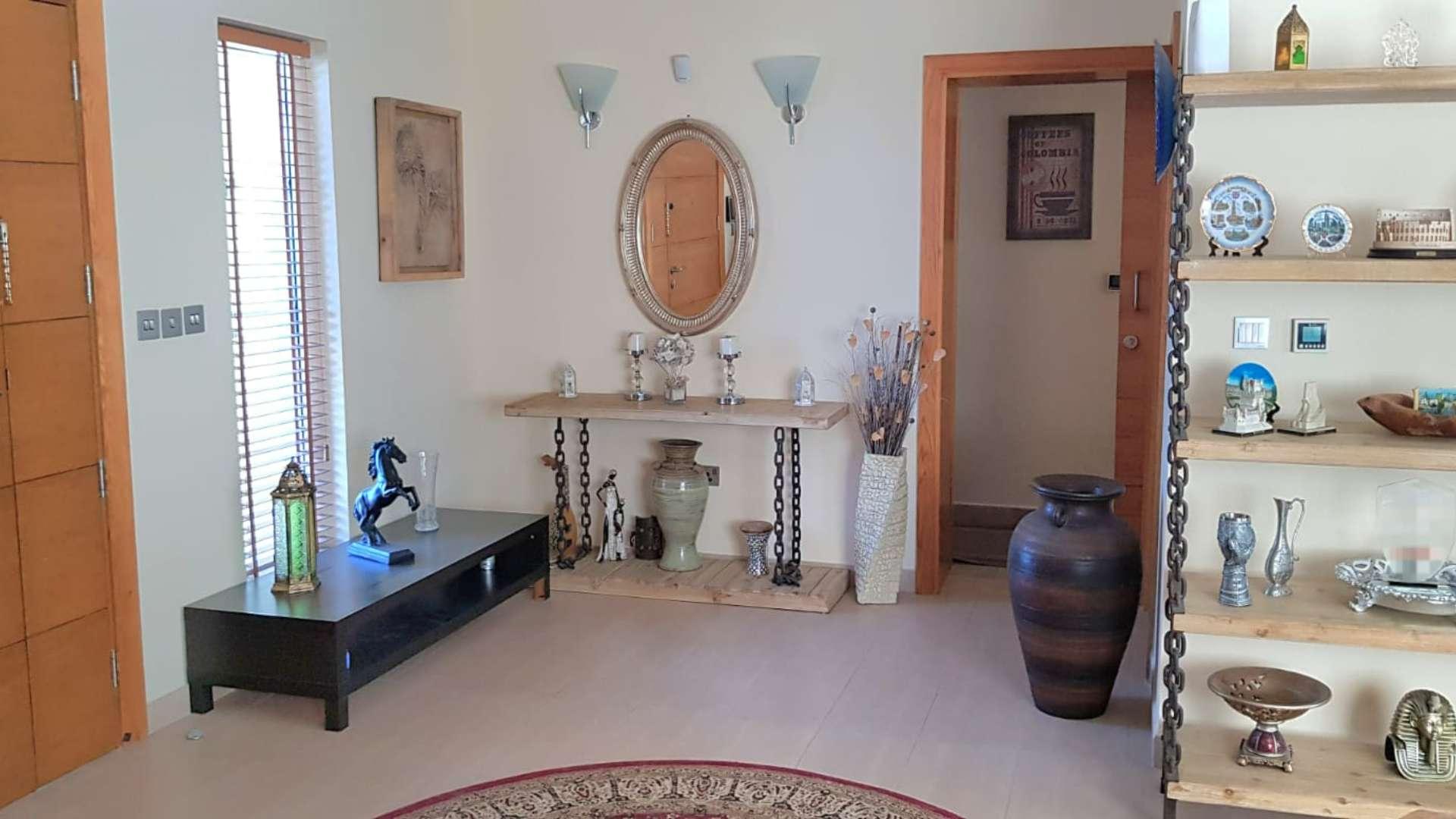 Rooftop garden terrace with seating in Legacy Nova Villa, Jumeirah Park, sunlit and scenic view