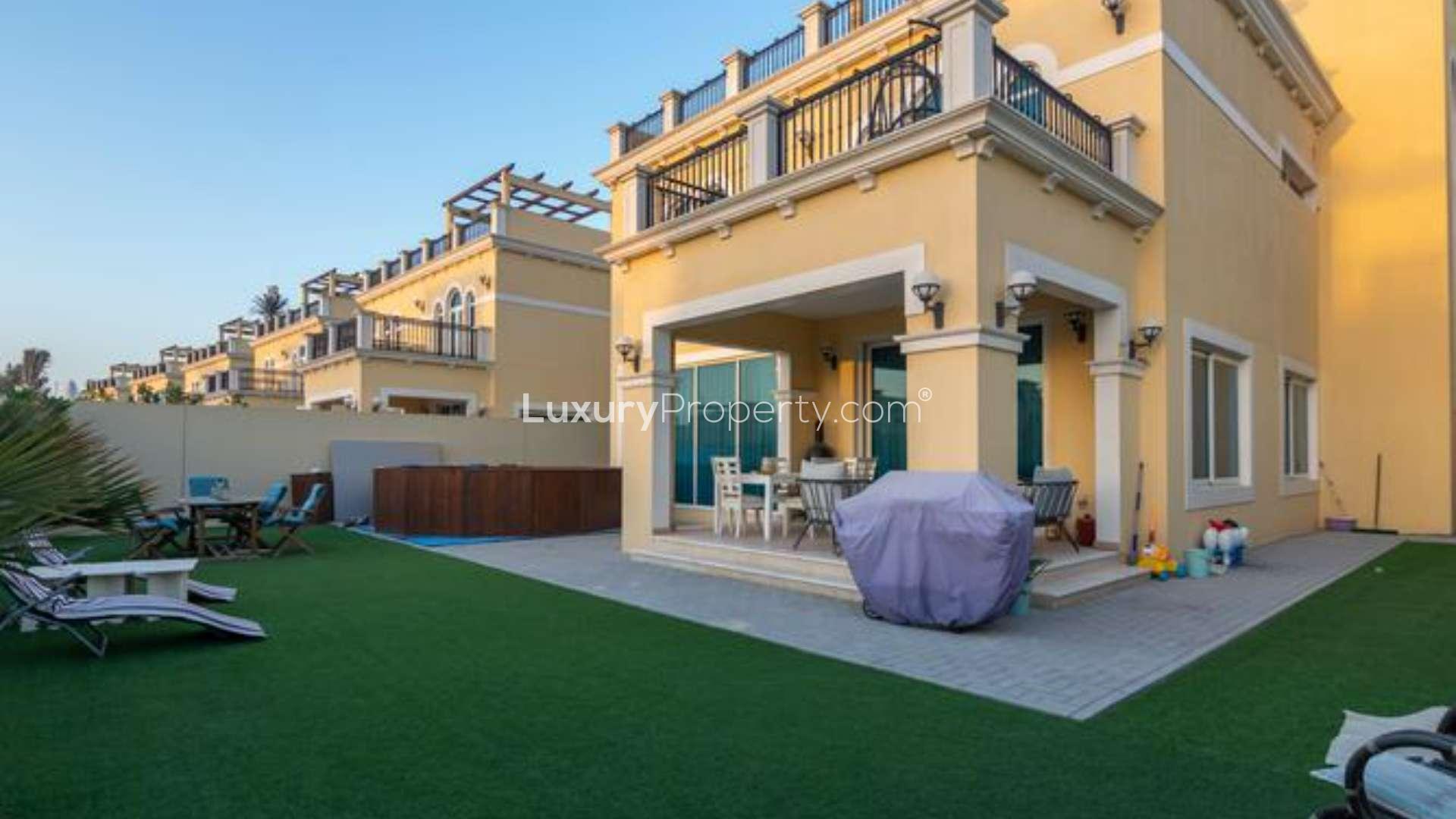 Spacious living area with large windows in 4-bedroom Legacy Nova Villa, Jumeirah Park