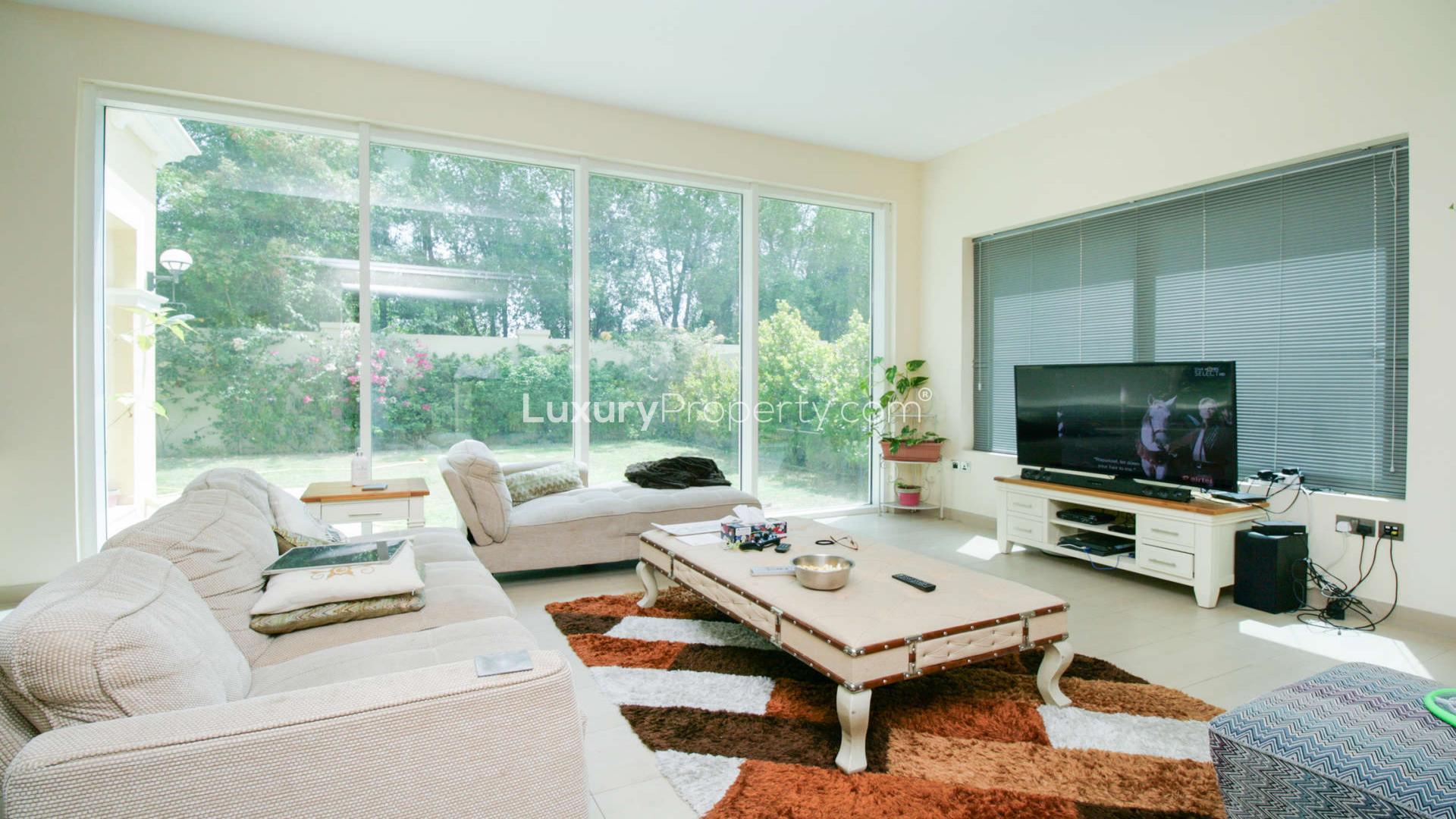 Modern living room in Legacy Nova Villa, Jumeirah Park with elegant decor and natural light