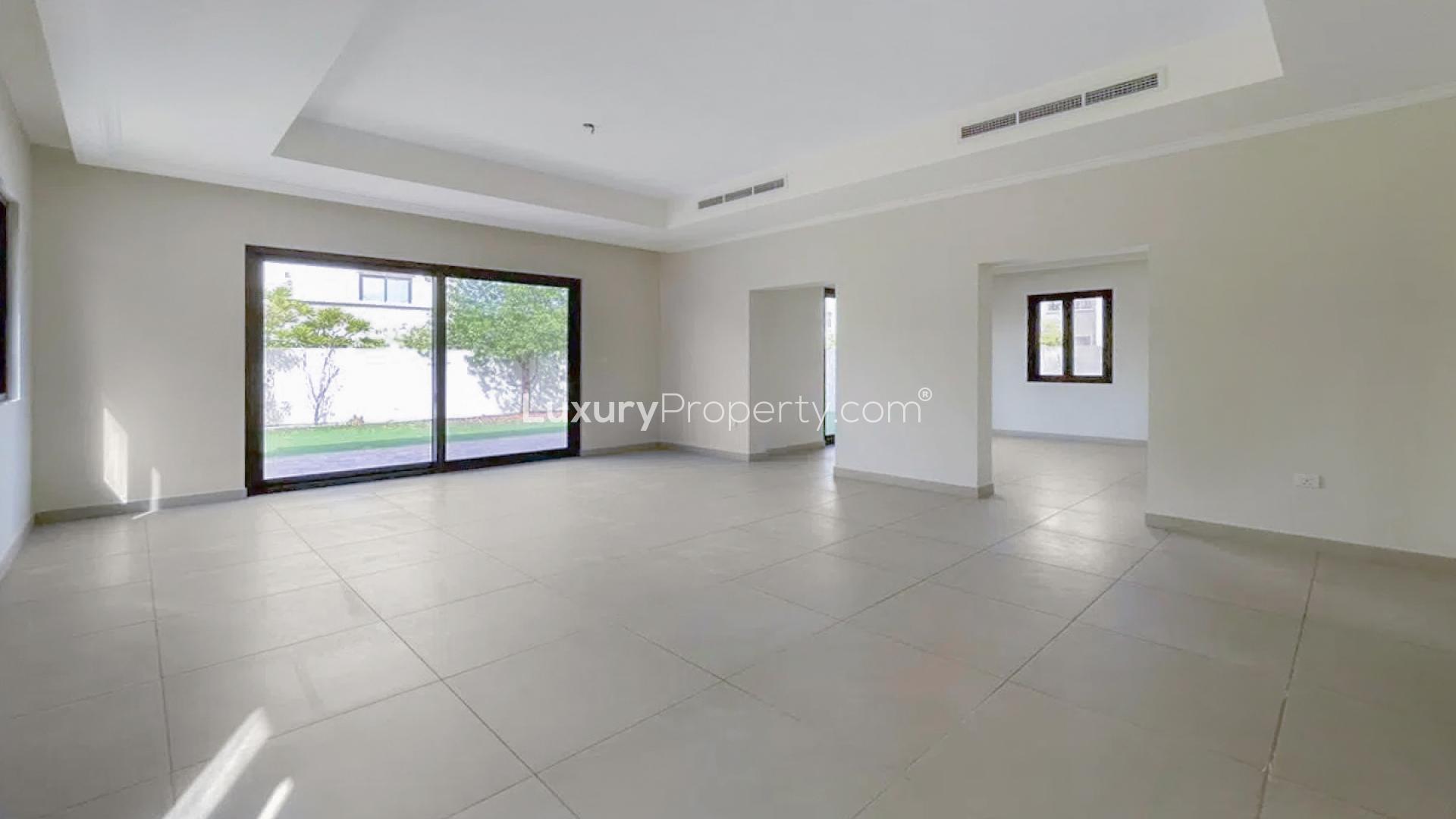 "Spacious backyard of 4-bedroom villa in Lila, Arabian Ranches 2, available for rent.",Spacious living area in 4-bedroom villa, Lila, Arabian Ranches 2, available for rent