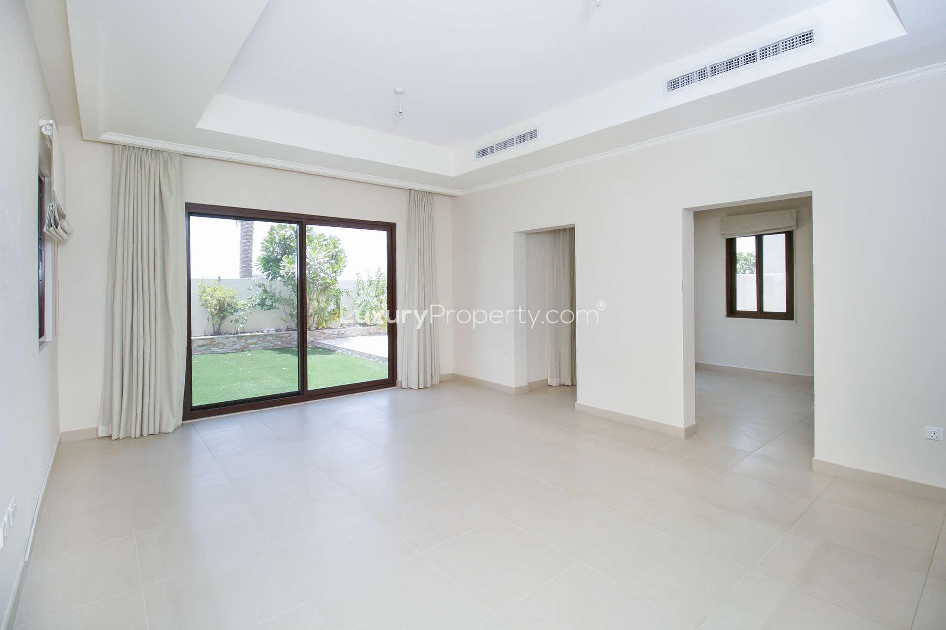 Bright living room with garden view in 4-bedroom villa, Lila, Arabian Ranches 2