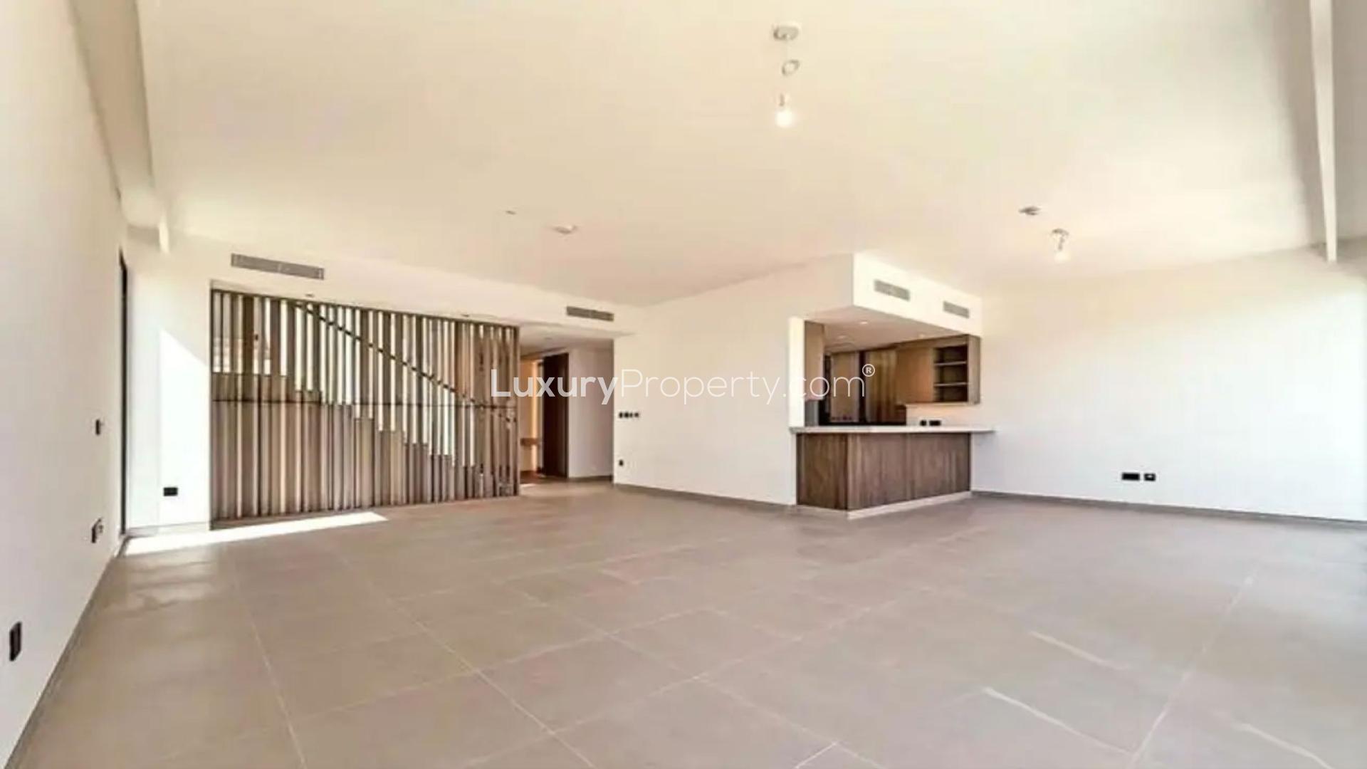 Stylish single-row villa exterior with lawn in Harmony 3, Tilal Al Ghaf, for rent