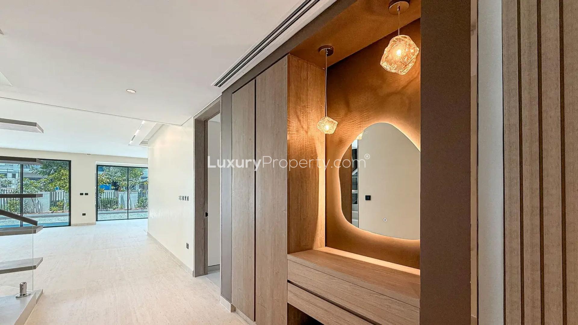 Outdoor pergola in upgraded 4-bedroom villa, Harmony 3, Tilal Al Ghaf, for rent