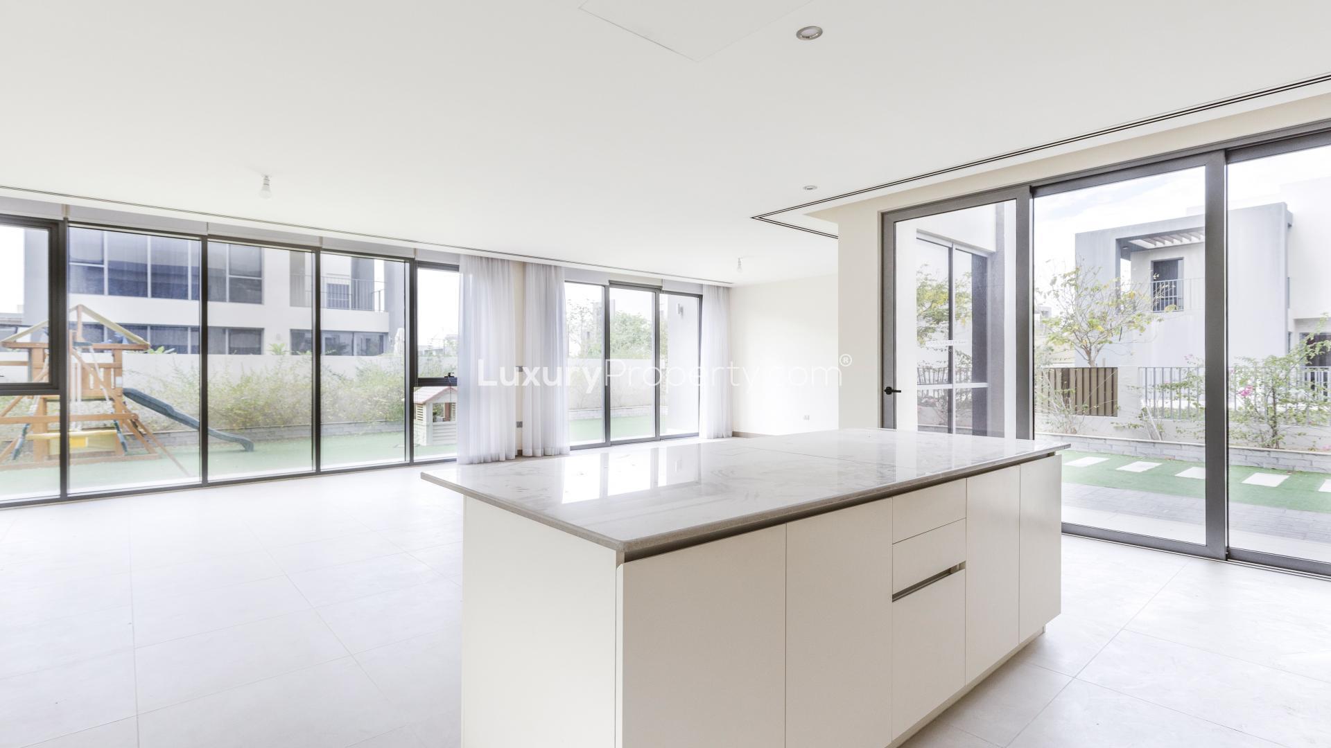 Modern 4-bedroom villa exterior with garden, Dubai Hills Estate, Sidra Villas