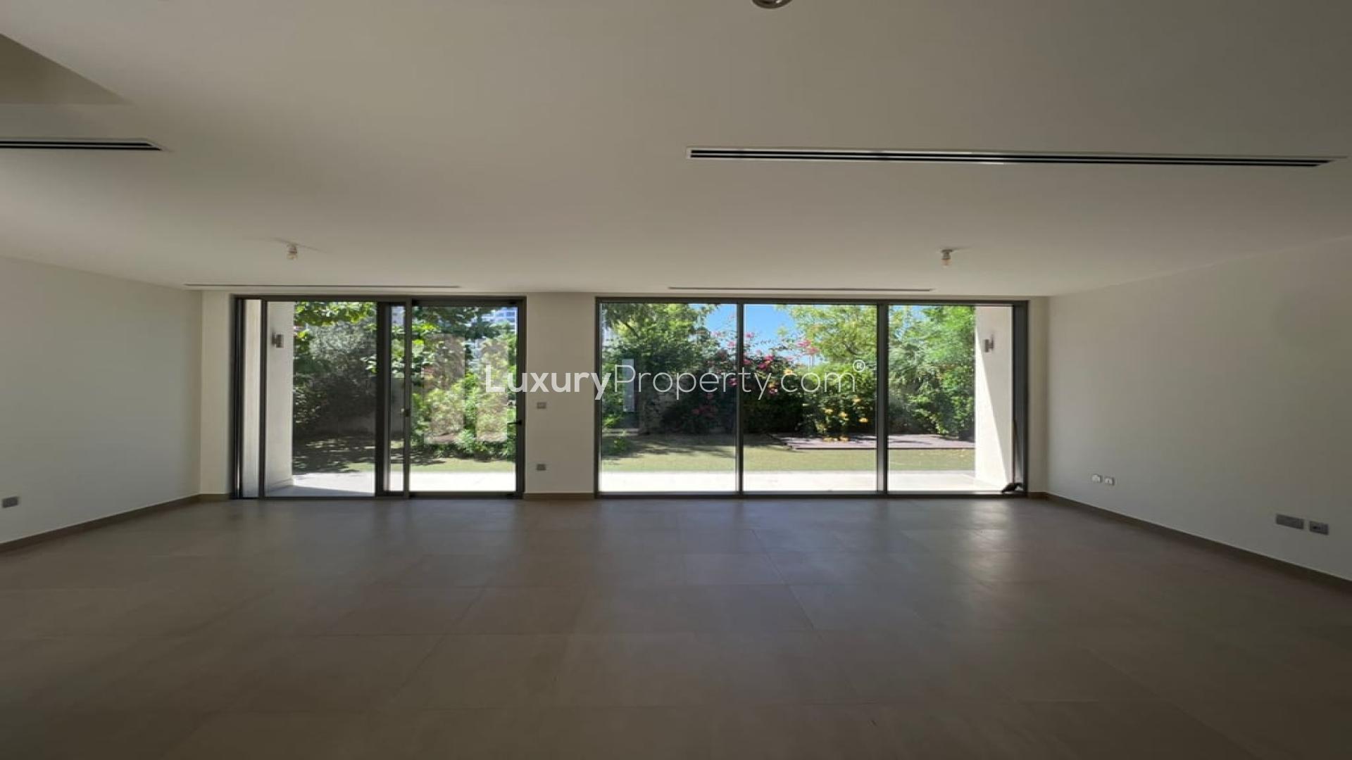 Exterior view of spacious villa with large garden at Sidra Villas, Dubai Hills Estate