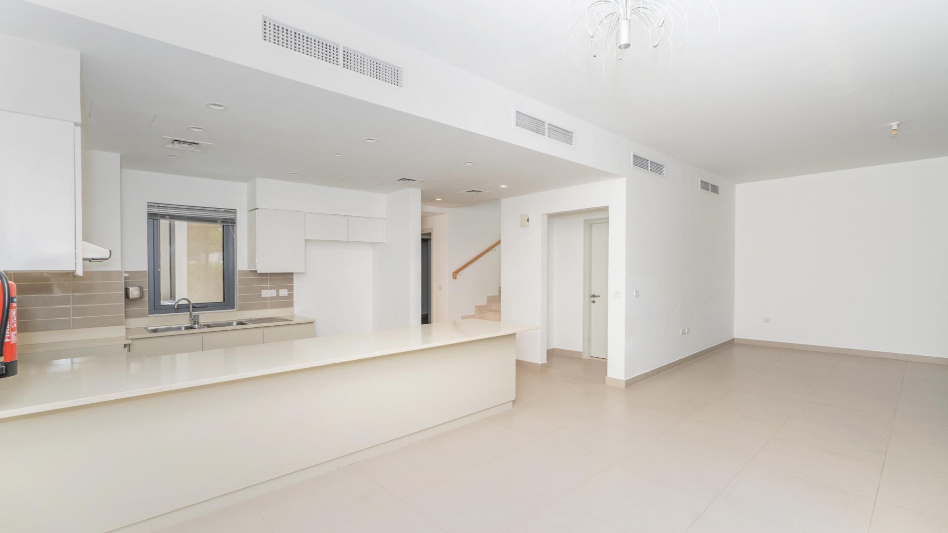 Balcony view from 4-bedroom villa in Maple 1, Dubai Hills Estate, overlooking park and pool