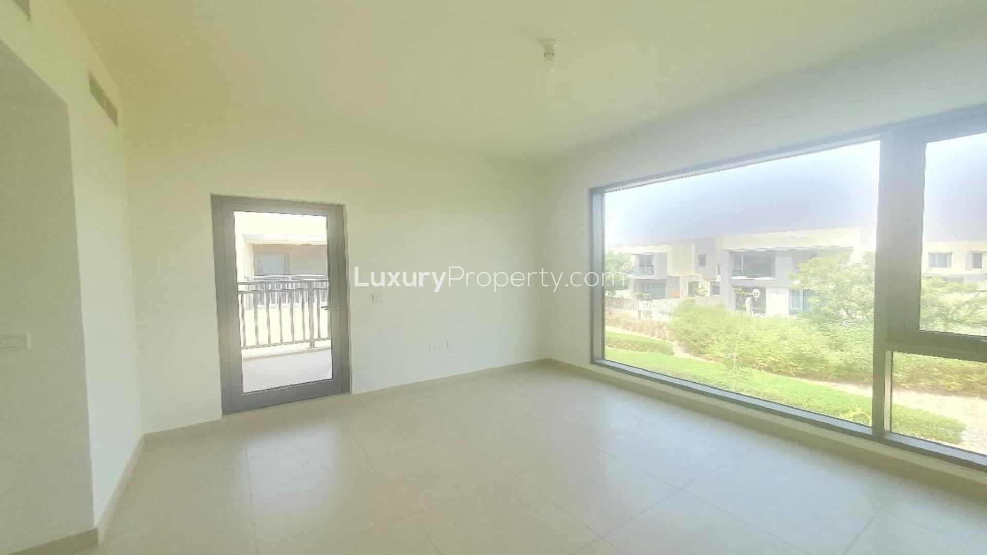 Exterior view of villa with garden in Maple at Dubai Hills Estate, available for rent