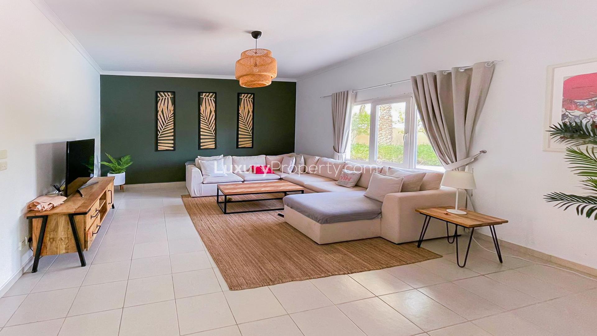 Spacious living room in Meadows 9 villa with modern decor and natural light