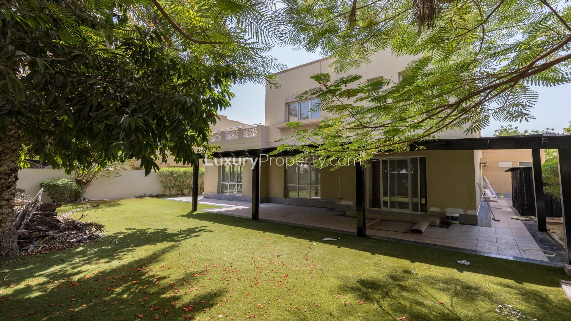 Spacious living area with garden view in 4-bedroom villa, Meadows 7, Dubai