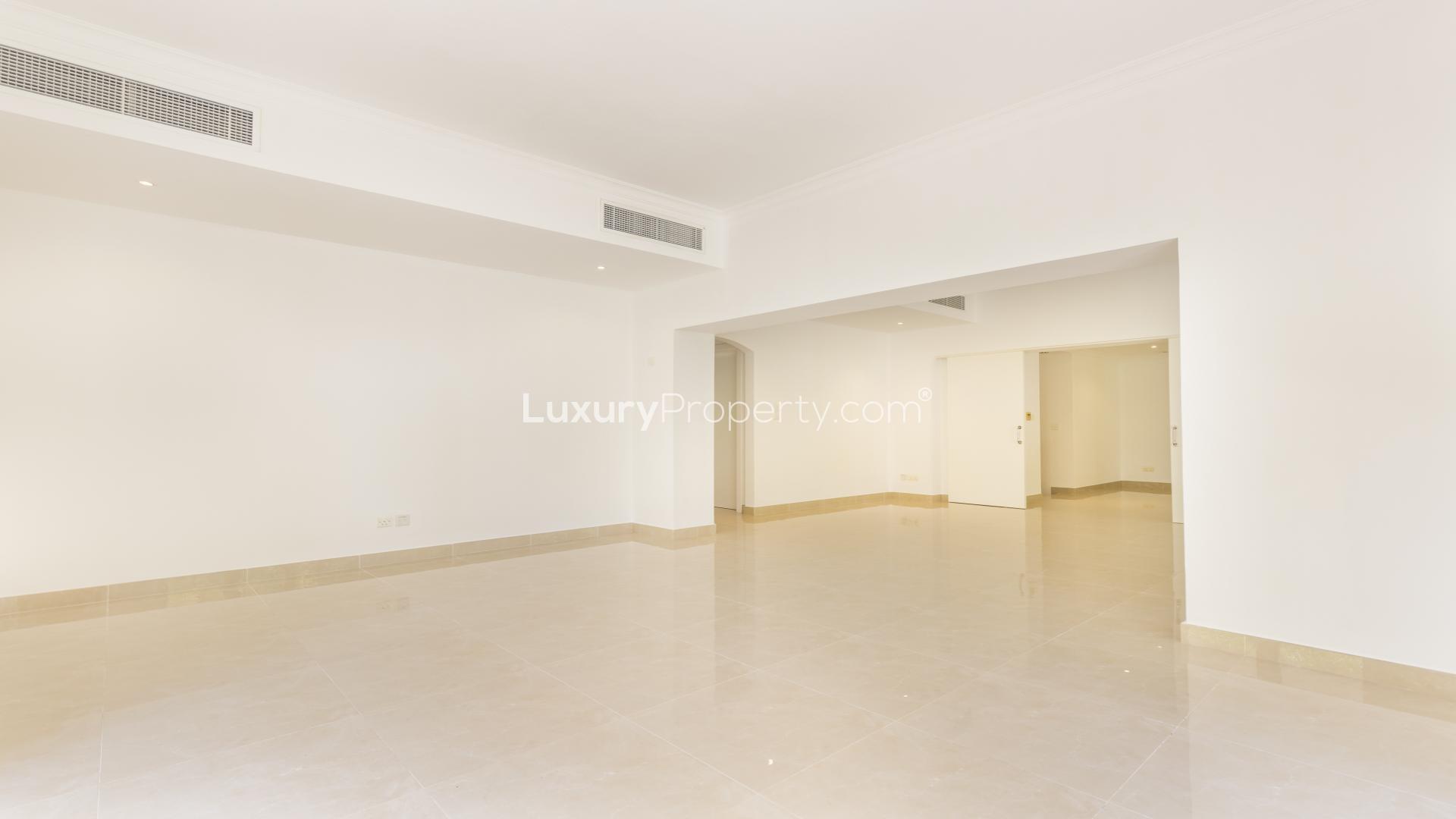 Exterior view of 4-bedroom villa with spacious garden in Meadows 7, Dubai for rent