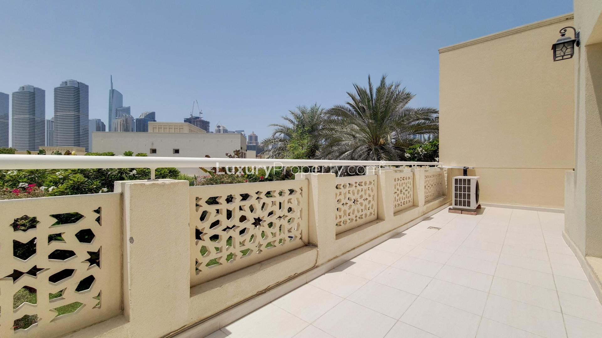 Luxurious living room in spacious Meadows 2 villa with elegant decor and ample seating