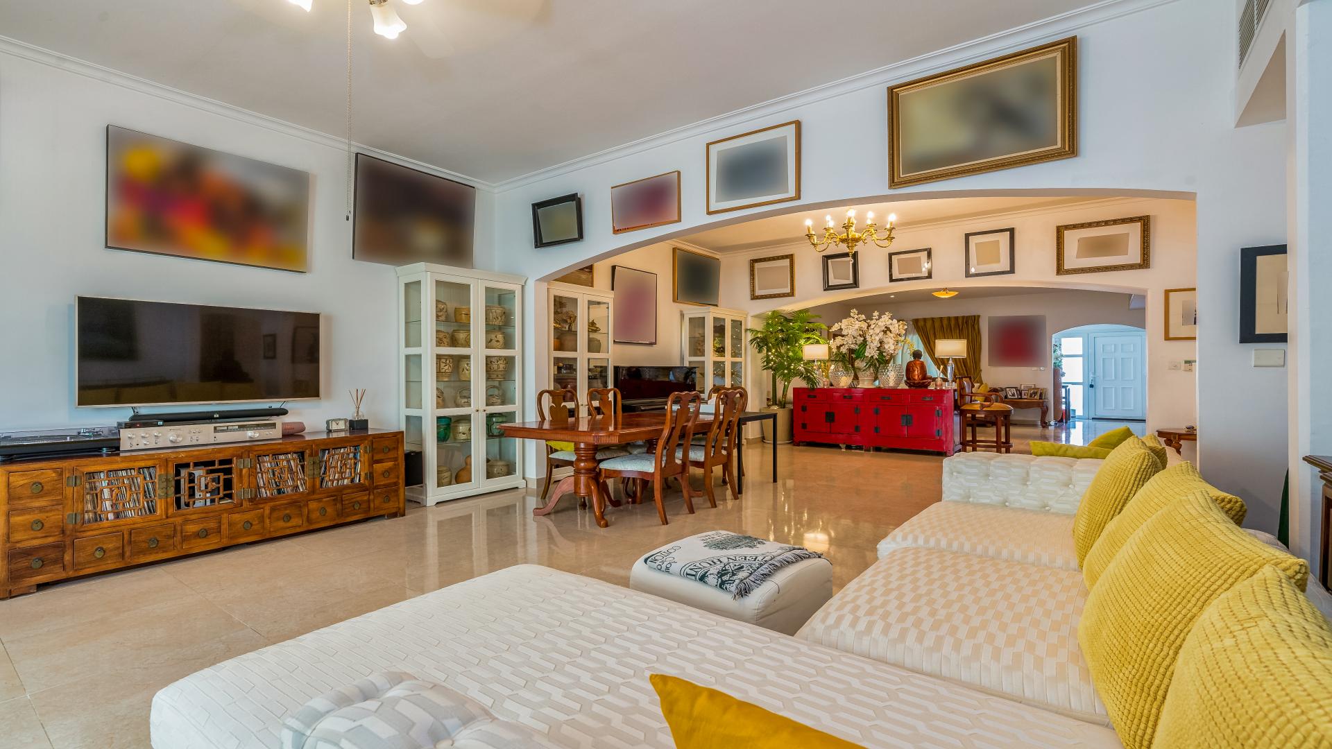 Luxurious living room in fully upgraded Meadows 9 villa with elegant decor and spacious layout