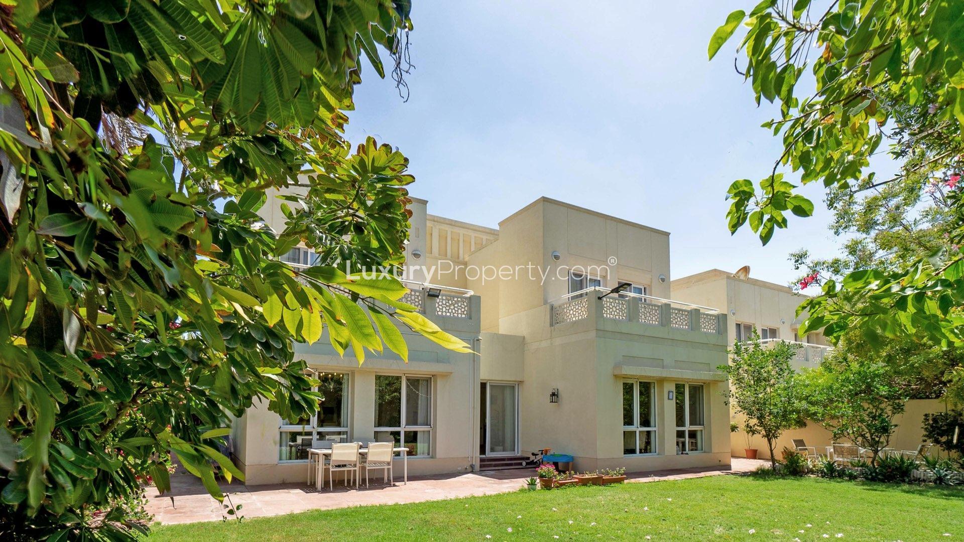 Luxurious living room in 4-bedroom villa, Meadows 2, Dubai, featuring elegant decor and furnishings