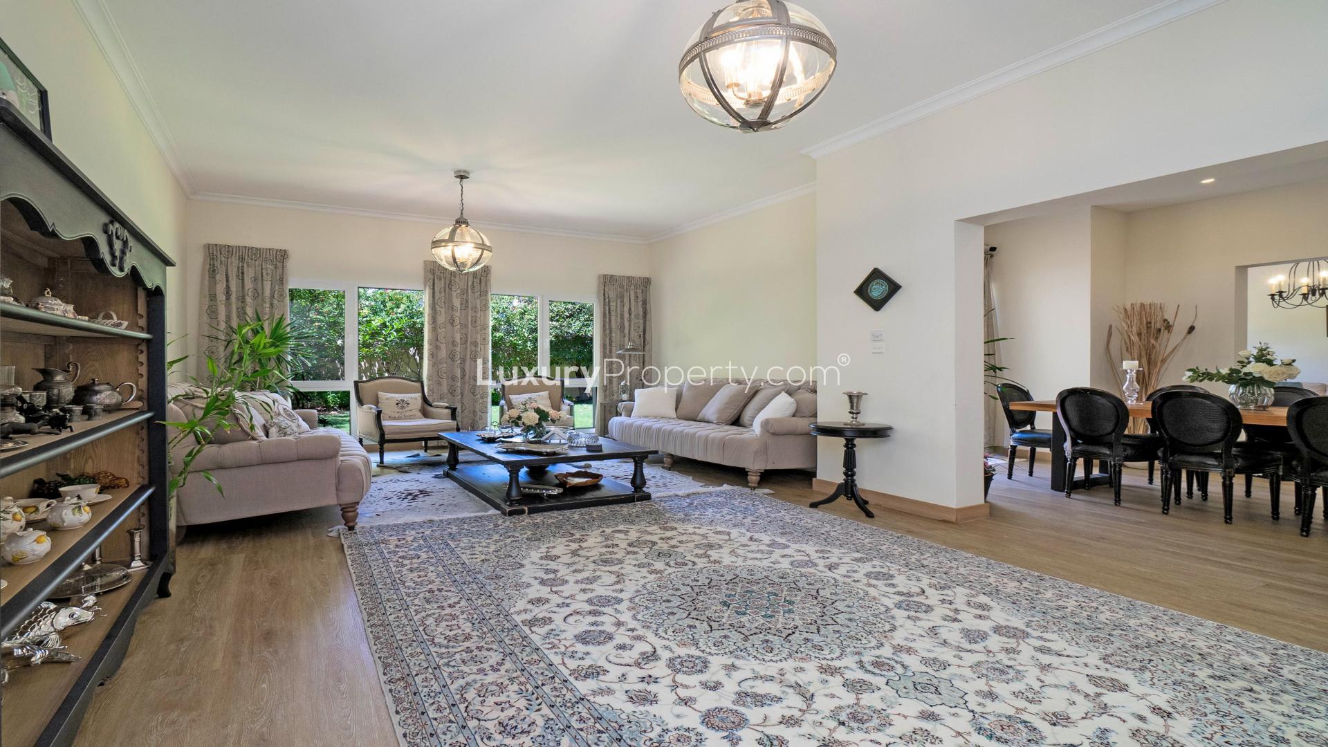 4-bedroom villa exterior with landscaped garden in Meadows 2, Dubai, available for rent