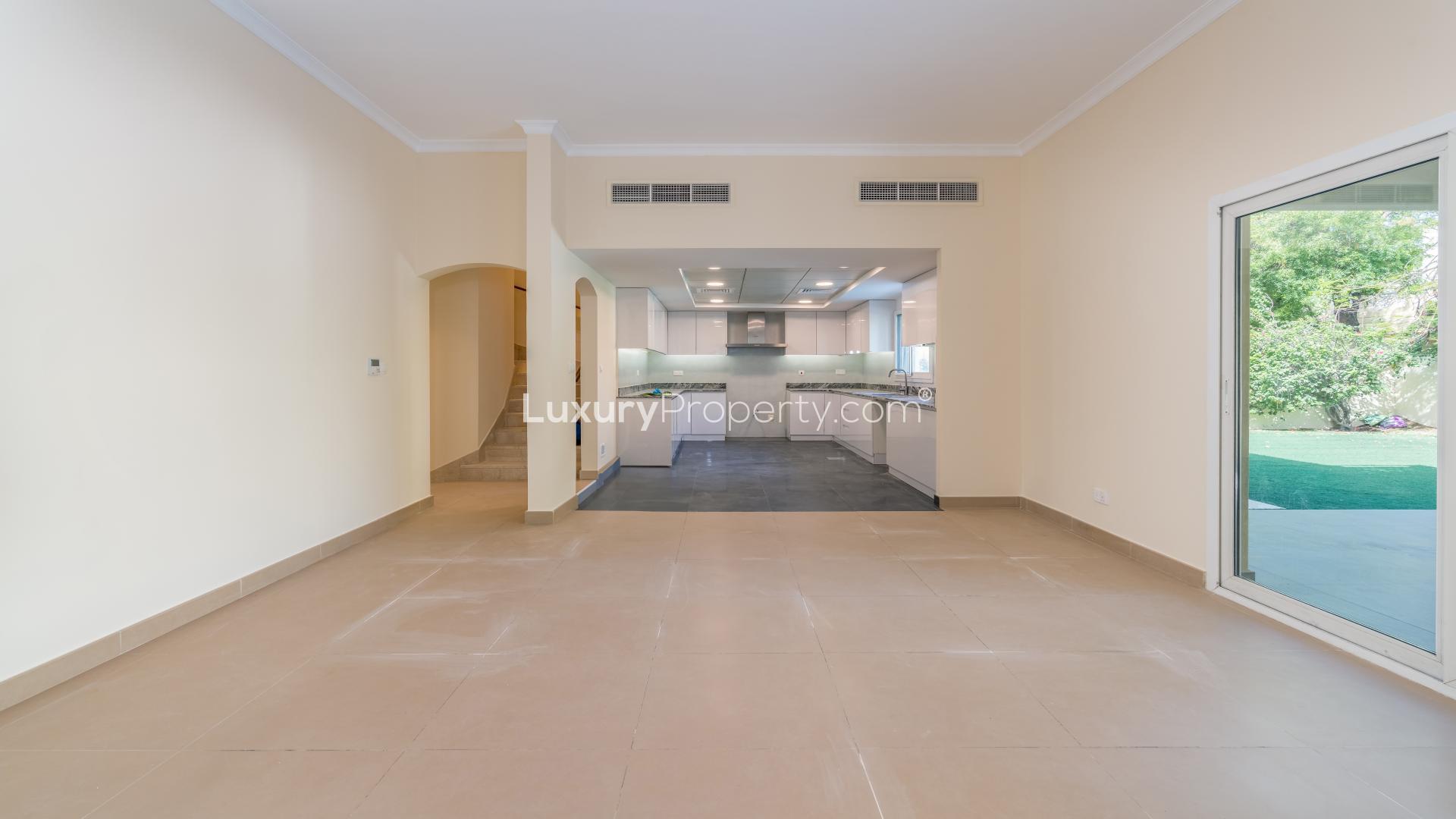 Luxurious villa exterior with spacious garden in The Meadows, Emirates Living for rent