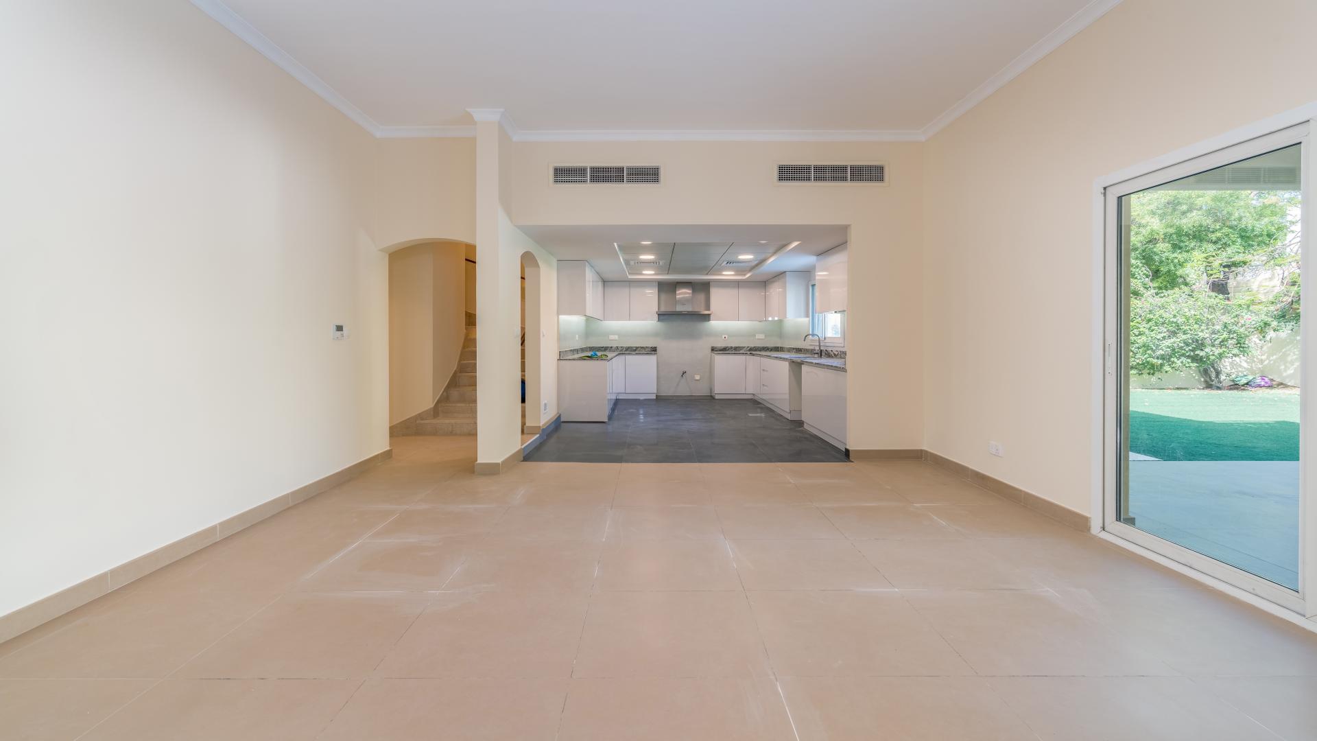 Luxurious villa exterior with spacious garden in The Meadows, Emirates Living for rent