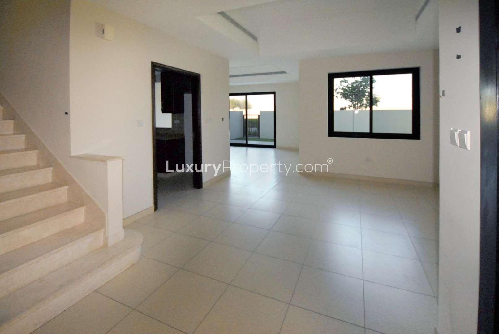 Four-bedroom villa exterior with green views in Mira 2, Reem, available for rent