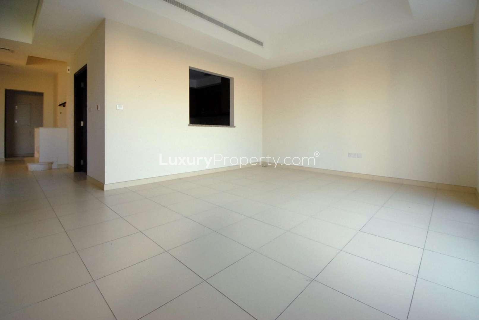 Empty room with large window in Mira 2 villa, Reem community, ready for rent