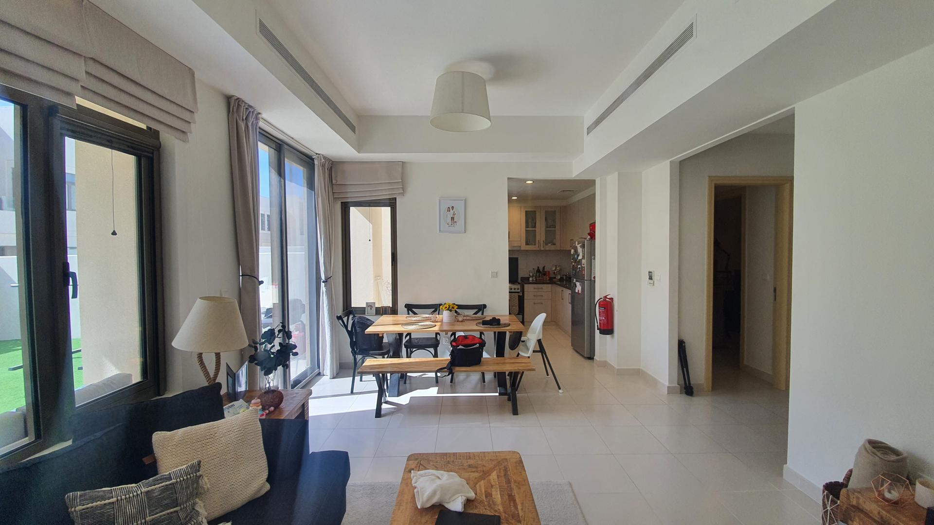 Living room with large windows in 4-bedroom villa, Mira Community, Reem