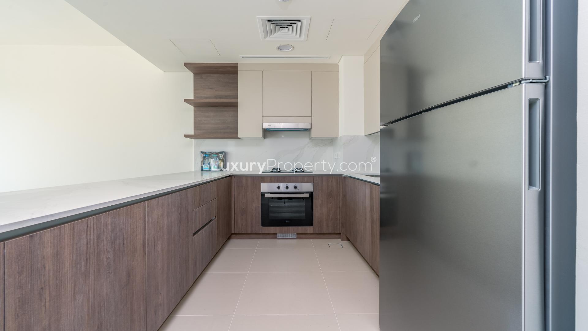 Modern kitchen in brand new Elan Villa, Tilal Al Ghaf, available for rent