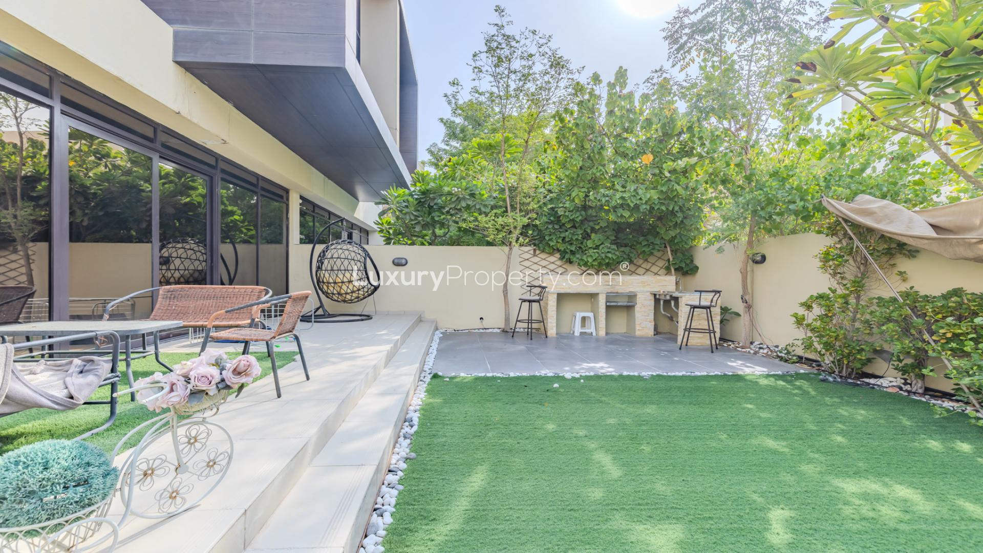 Elegant dining area in 4-bedroom villa, Damac Hills, Queens Meadow, available for rent