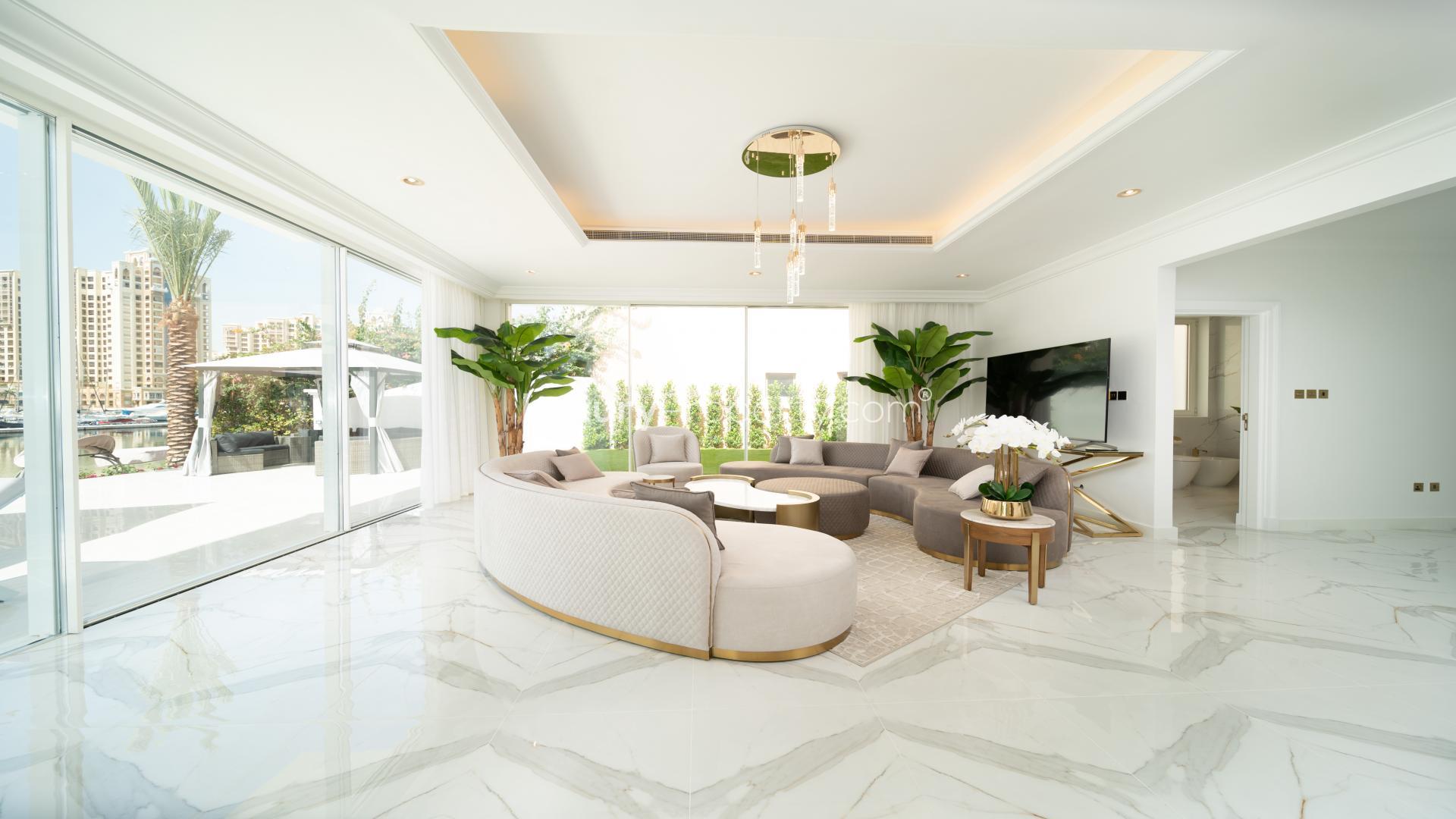 Outdoor pool and patio area of Palm Jumeirah Garden Homes villa for rent