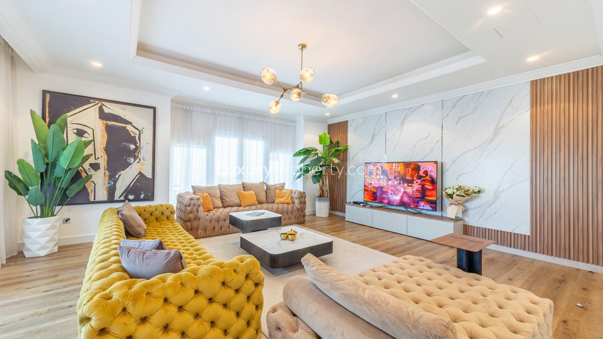 Stunning upgraded villa exterior with lush garden in Palm Jumeirah's Garden Homes community