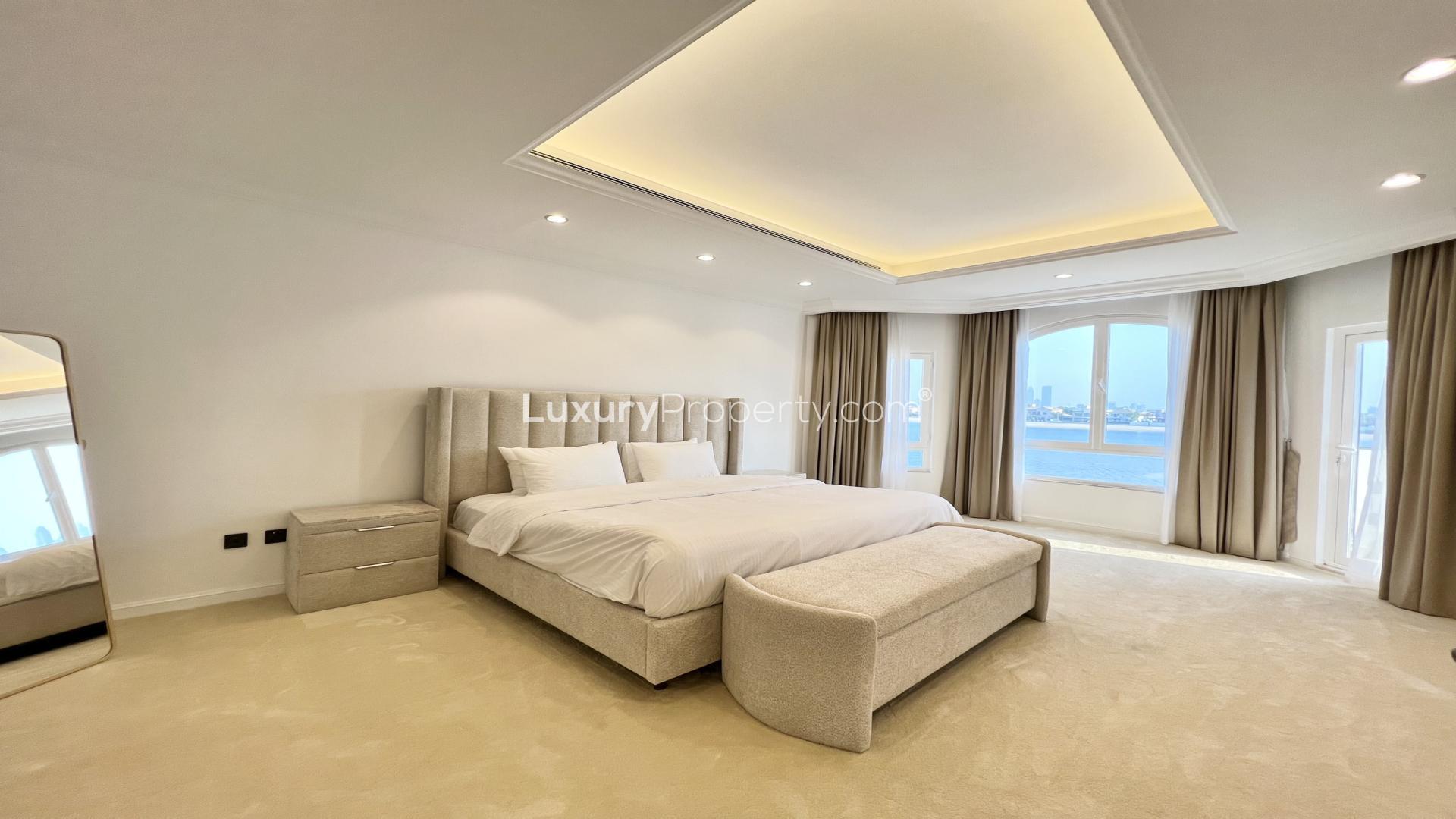 Modern kitchen in upgraded 4-bedroom villa, Garden Homes, Palm Jumeirah. Bright, spacious, marble accents