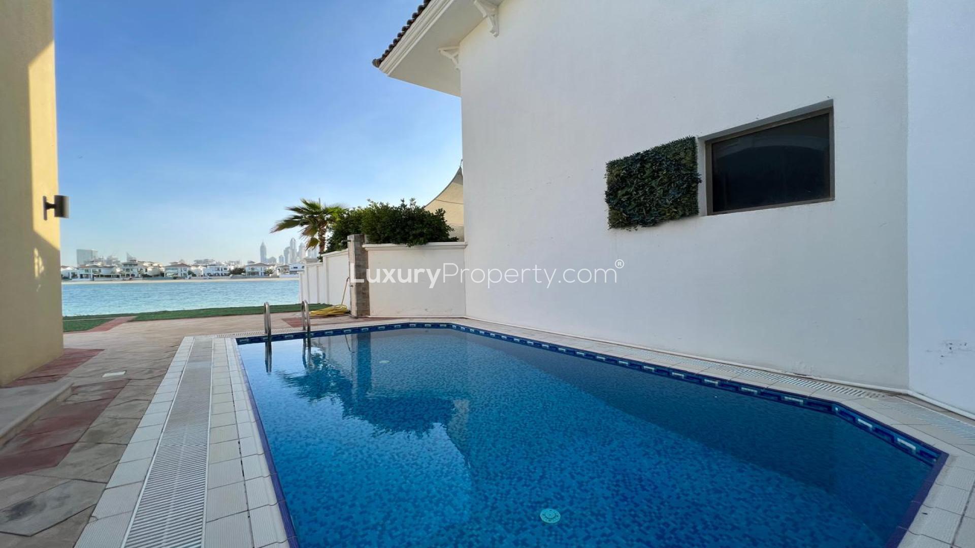 Spacious living room with sea view in Palm Jumeirah Garden Homes villa for rent