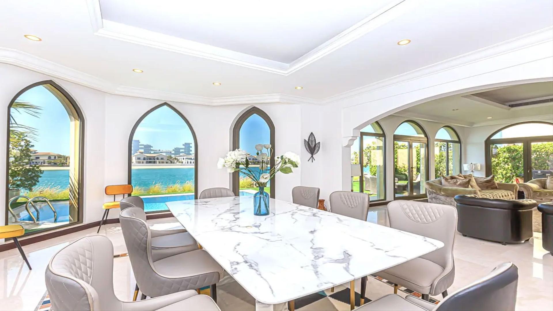 Private pool and beachfront view from 4-bedroom villa in Palm Jumeirah Garden Homes