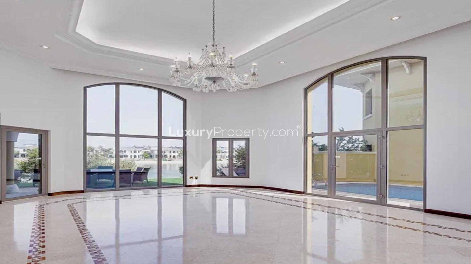 Beachfront villa with central-rotunda style, lush garden, and private entrance in Palm Jumeirah
