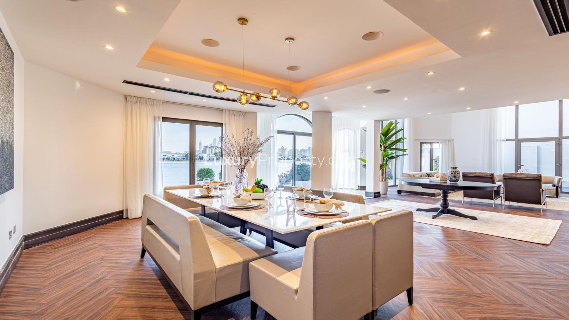 Spacious living room in renovated Palm Jumeirah villa with sea view and modern decor