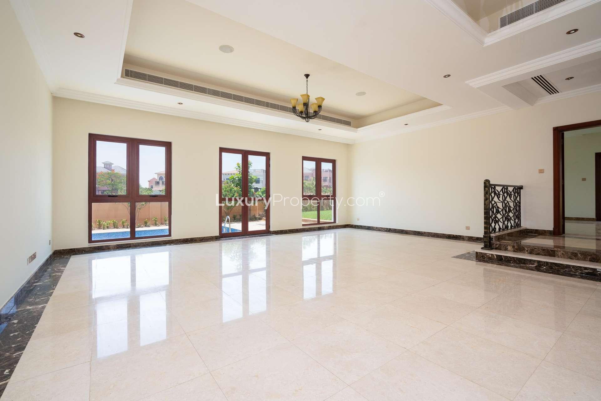 "Spacious living area in 4-bedroom villa, Orange Lake, Jumeirah Golf Estates, for rent.",Spacious living room in 4-bedroom villa, Orange Lake, Jumeirah Golf Estates, with marble flooring