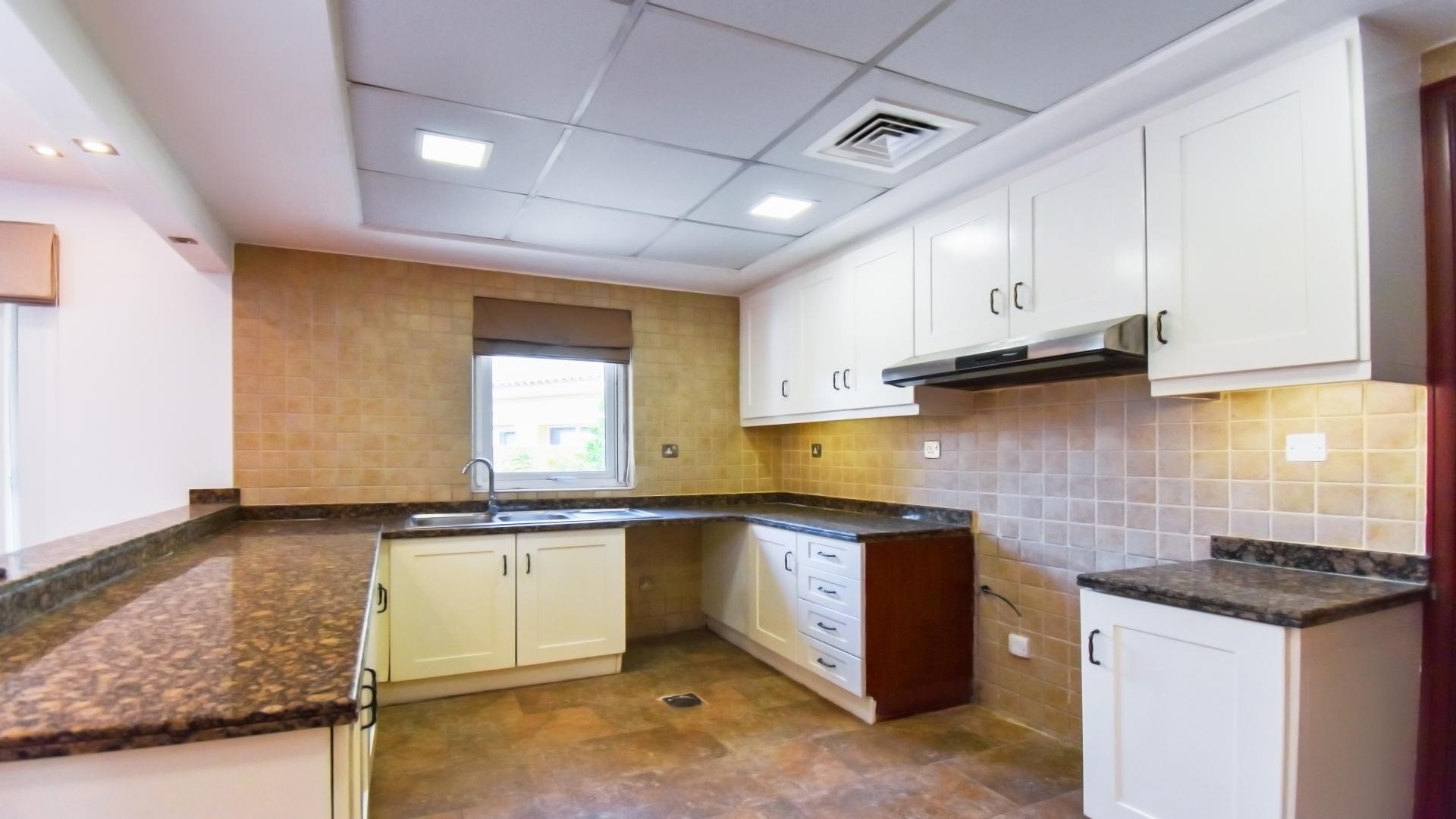 Modern kitchen in fully upgraded Arabian Ranches villa, Palmera community, available for rent