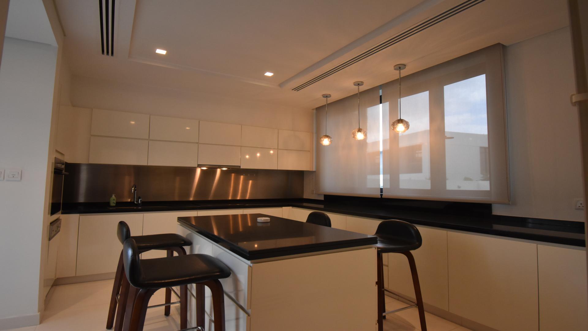 Modern living room with elegant decor in Damac Hills villa, Picadilly Green, for rent