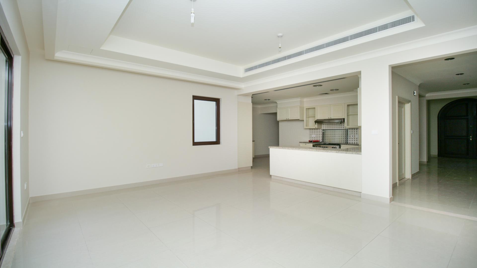 "Spacious balcony view of Rasha villa in Arabian Ranches 2, ideal family rental home.","Spacious open-plan kitchen and living area in Arabian Ranches 2 Rasha villa for rent.",Modern kitchen with granite countertops in Rasha villa, Arabian Ranches 2, for rent