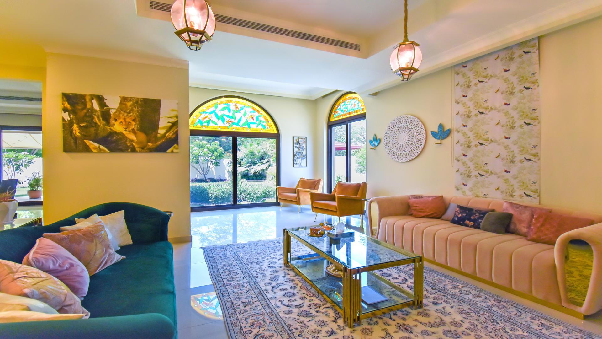 Luxurious living room in Rasha villa, Arabian Ranches 2, with garden view and elegant decor