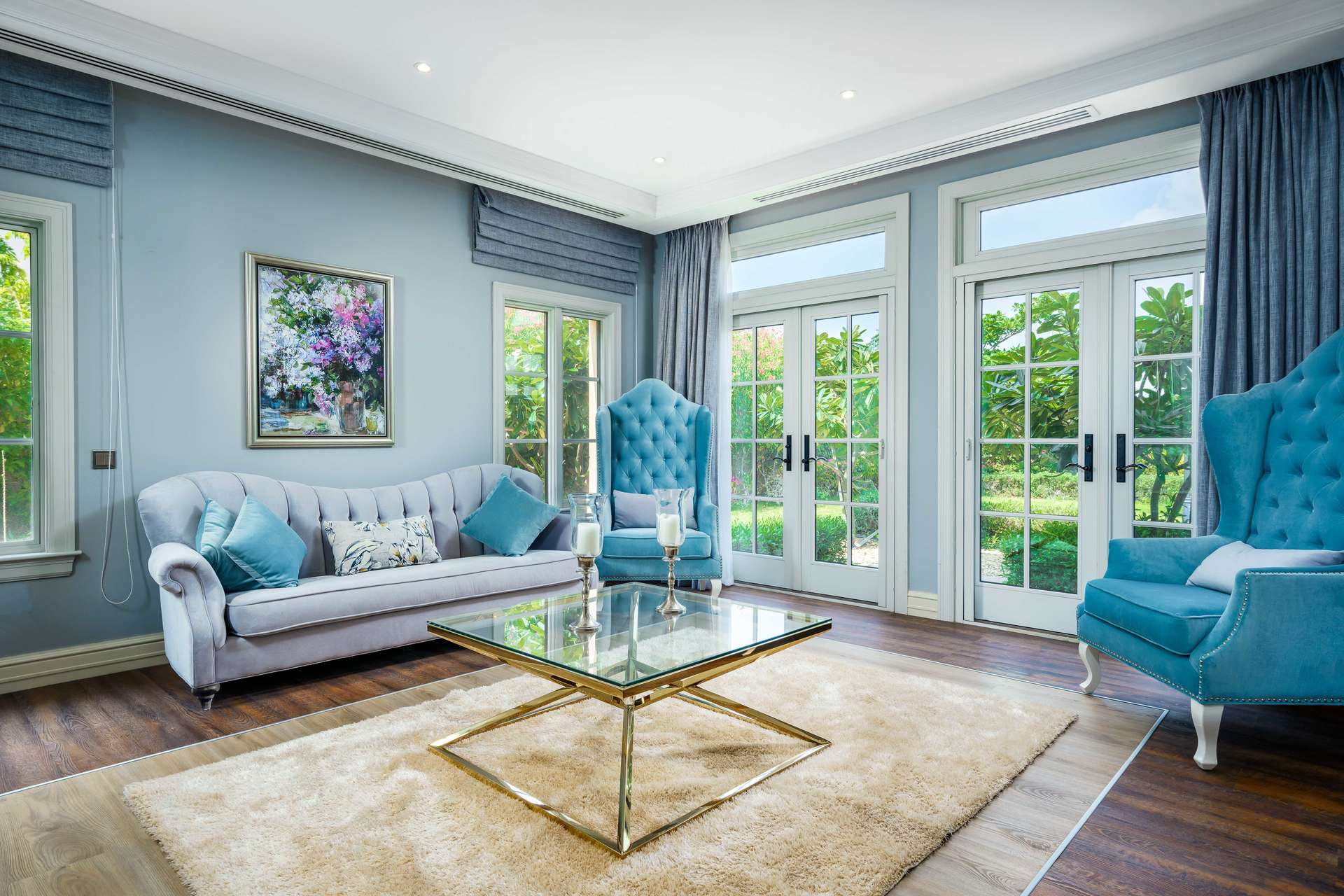 Spacious kitchen with island and open plan living area in Jumeirah Golf Estates villa