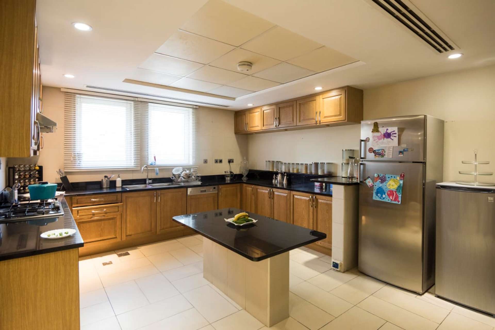 Upgraded villa exterior with palm tree, patio in Jumeirah Park, Regional sub-community